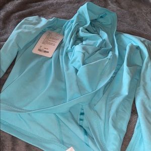 Ivivva blouse meant to be worn with shirt